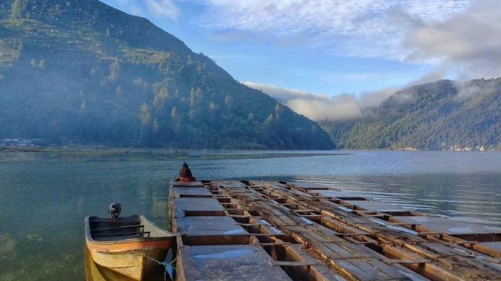 Pesona Danau Tigi: Keindahan Tersembunyi di Pegunungan Papua Pesona Danau Tigi: Keindahan Tersembunyi di Pegunungan Papua
